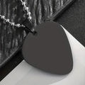 Close-up of matte black guitar pick pendant with stainless steel bead chain on leather - Black