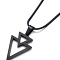 Macro shot of minimalist black overlapping geometric triangle pendant on snake chain - Black