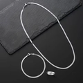 Driedelige roestvrijstalen sieradenset met slangenketting, armband en een ring - 3-delige set / Zilver
