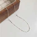 Detailed close-up of S925 sterling silver heart and bead chain on a wooden box - 925 Silver / White Silver