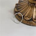 Macro shot of 925 sterling silver knuckle ring featuring irregular tin foil texture - Size 5 / Textured Ring