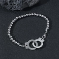 Creative stainless steel handcuff link bracelet with ball chain on leather background - Silver