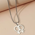 Macro detail of silver stainless steel interlocking double Venus symbol pendant necklace - Silver (Box Chain)