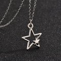 Collana retrò con ciondolo a doppia stella in acciaio inossidabile e design minimal - Argento