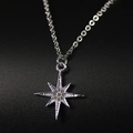 Collar minimalista de plata con colgante de estrella y cristales brillantes de micro pavé - Collar de Estrella de Ocho Puntas Plateado