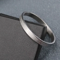 Brushed silver stainless steel bangle with engraved cross and Roman prayer text - Silver (Prayer Text)
