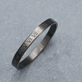 Macro shot of matte gunmetal stainless steel bangle with engraved Roman numerals - Black (Roman Numerals)
