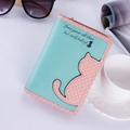 Detail of mint green and pink patchwork wallet with cat silhouette and polka dots - Short / Green