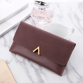 Elegant wine red long tri-fold wallet for women with gold V-hardware on marble surface - Pink Purple