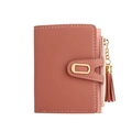 Close-up of pink-brown faux leather wallet with tassel and gold buckle detail - Deep Pink