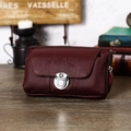 Detail of dark red leather belt pouch with litchi texture and metal twist lock - Horizontal Wine Red Leather