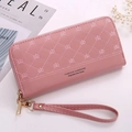 Pink quilted long wallet featuring crown embroidery, wristlet strap, and gold zipper - Light Pink