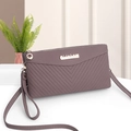 Purple faux leather crossbody bag with lychee texture and V-stitch detail - Deep purple