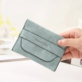 Blue matte suede short wallet for women featuring elegant style text and snap closure - Light Blue