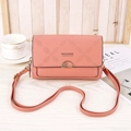 Pink faux leather crossbody bag with rhombic hollow pattern and golden flower lock - Pink