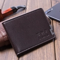 Dark brown lychee grain leather driver's license wallet with metal trim on wooden desk - Dark Coffee