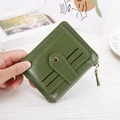 Detail view of vintage green leather wallet with card slots and metal zipper pocket - Green