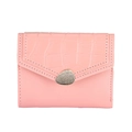 Detail of pink faux crocodile skin texture and envelope flap with gold metal buckle - Pink