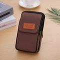 Detail view of brown canvas belt pouch with dual zippers and Sport label on wooden desk - 2-Layer Vertical Coffee