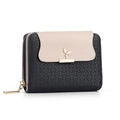 Short beige and black contrast wallet for women featuring a golden sprout logo on white backdrop - Black