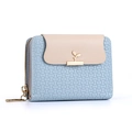 Compacte damesportemonnee in lichtblauw en beige met goudkleurige bladvormige gesp - Blauw