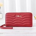 Red long wallet for women featuring wave quilting and golden bow metallic ornament - 7" / Red