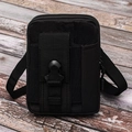 Tactical black nylon waist bag with double zippers and pen holder on wooden background - Black
