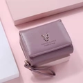 Lavender PU leather tri-fold wallet featuring a silver reindeer deer antler metal accent - Purple