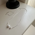Elegante collana a serpente in argento s925 con perla bianca e ciondolo a sfera d'argento - Argento 925 / Argento