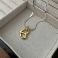 Elegant S925 sterling silver necklace with a two-tone hollow heart pendant in gold and silver - Gold Style (DZ050)