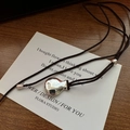 S925 sterling silver money bag pendant necklace on a brown woven cord and white card - Money Bag Style (TLW034) / 925 Silver / Brown