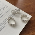 Three-piece set of S925 sterling silver beaded rings on a vintage book background - Adjustable Open / Silver Beaded Texture Ring Trio (23JZ21)