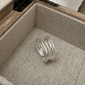 Macro view of multi-layer S925 silver ring with rope texture in a linen jewelry box - One Size / Silver Multi-layer Interwoven Style (JZX080)