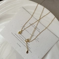Elegant gold S925 sterling silver U-shaped pendant necklace on a textured white card - 925 Silver / Gold
