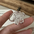 S925 sterling silver hollow flower open ring with textured petals shown on hand - Adjustable Open / Hollow 3D Flower Style (JZA076)