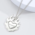 Minimalist silver spinning heart necklace with burning love engraved flame pendant - Silver