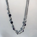 Detailed close-up of mixed texture titanium steel chain necklace with blue ice-cracked beads - Multicolor