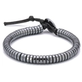 Detail of woven hematite bead bracelet with grey metallic luster on a white background - Disc Beads Style (Model B)