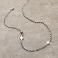 Collana minimalista in acciaio al titanio con doppi fili e pendenti a stella - Argento