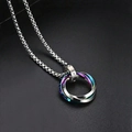 Macro view of interlocking triple rings necklace with iridescent and silver metal finish - Multicolor Triple Ring