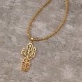 Detailed close-up of golden geometric cactus pendant on a fine box chain necklace - Gold