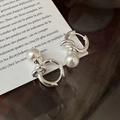 Elegant S925 sterling silver knot earrings with round pearls on a vintage paper - Knot Pearl Style (EHZ087) / 925 Silver