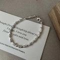 Elegantes S925 Sterlingsilber Perlenarmband mit feiner Textur auf einer weißen Karte - 925er Silber / Reiskorn Gewebte Textur (14SL25)