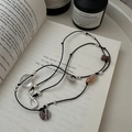Handmade S925 silver knot necklace with brown beads on a vintage book background - Handwoven Mixed Material Style (38TL14) / 925 Silver