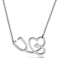 Macrodetail van de zilveren stethoscoop hart hanger met gepolijste afwerking aan O-ketting - Zilveren naald