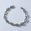 Dettaglio del bracciale a maglie chicco di caffè argento con chiusura a moschettone - Bracciale / Argento