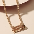 Collier chaîne épi dorée avec détail de vis et pendentif inscription Everything - Or