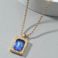 Baroque gold twisted chain necklace with large blue gemstone mirror pendant - Blue