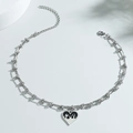 Collana con pendente a cuore di fiamma in acciaio inossidabile con catena regolabile - Color Acciaio