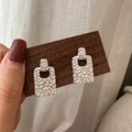 Handheld view of S925 sterling silver rectangular earrings with textured finish - Rectangular Textured Style (EH003) / 925 Silver